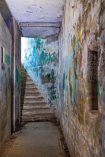 USA, Washington, Port Townsend, Fort Worden State Park. Corridor and stairway in old gun battery. Art Print